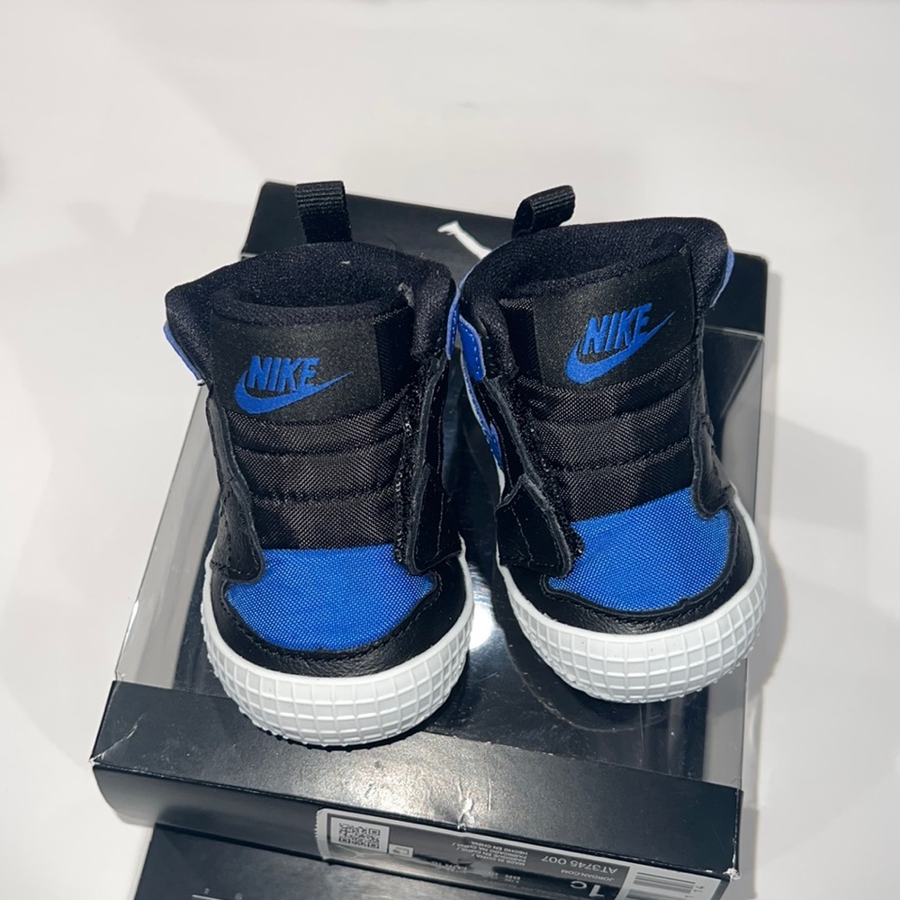 Jordan 1 crib booties. Comes with box.